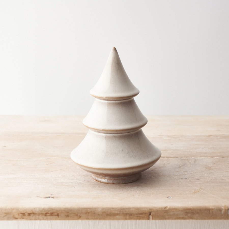 A beautifully crafted porcelain tree ornament with a natural reactive glaze.