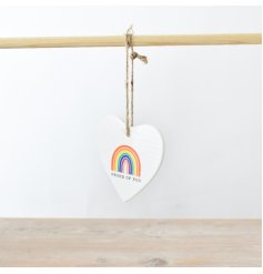 A stylish porcelain heart with a colourful rainbow design and 'proud of you' slogan.