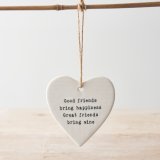 Humorous hanging ceramic heart decoration with message about friendship. 