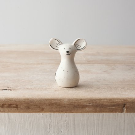 A small porcelain mouse ornament featuring a monochrome design, speckled pattern and cute face!