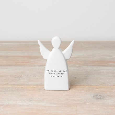 An angel ceramic ornament with "feathers appear when angels are near" wording. 