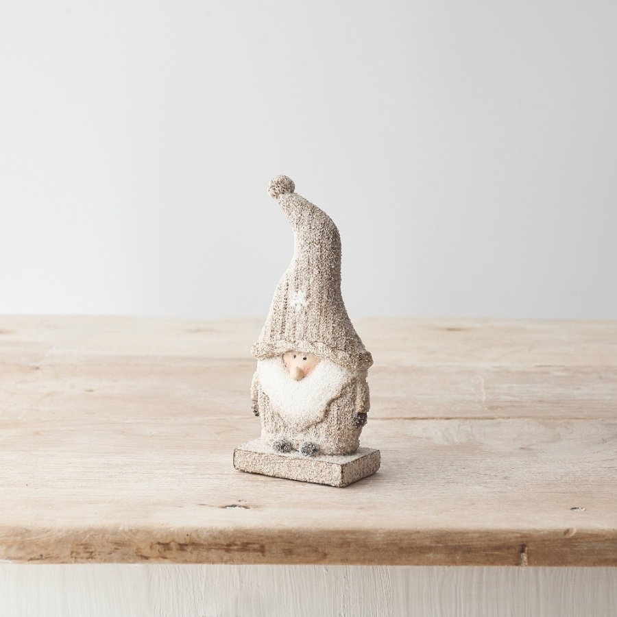 A super sweet little glittery Santa decoration in stylish neutral tones. 