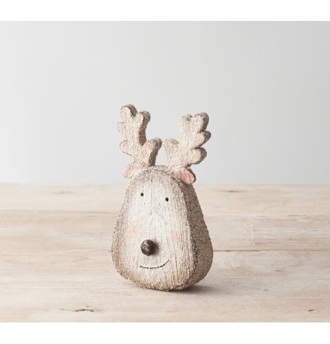 A super sweet reindeer face Christmas ornament featuring a cute smiley face, 3D nose and glittery finish. 