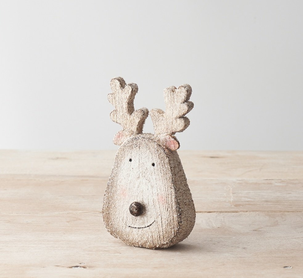 A cute reindeer face ornament with a cute little smiley face, 3D nose and glittery finish. 