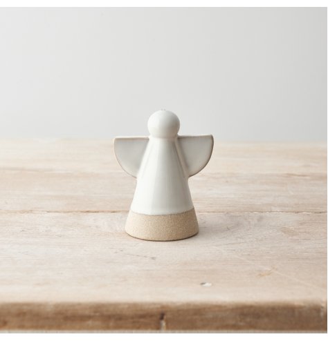 A simple yet stylish ceramic angel decoration with contrasting coloured edges and base. 