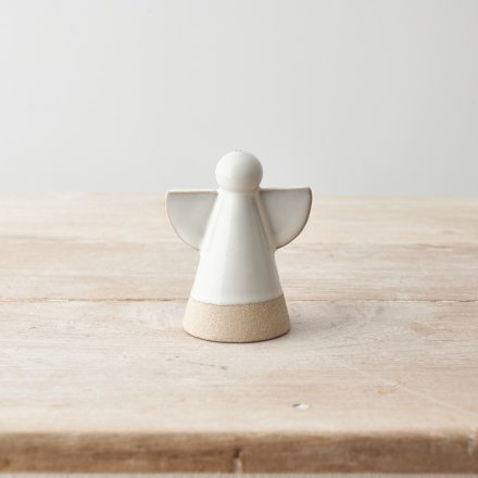 A ceramic angel ornament with a minimal clean design featuring contrasting coloured edges and border. 