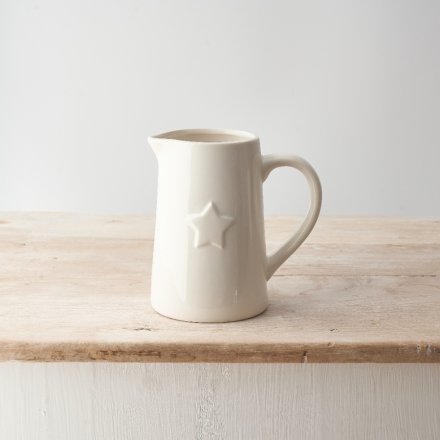 A stylish and chic ceramic jug with a 3D embossed star detail design. 