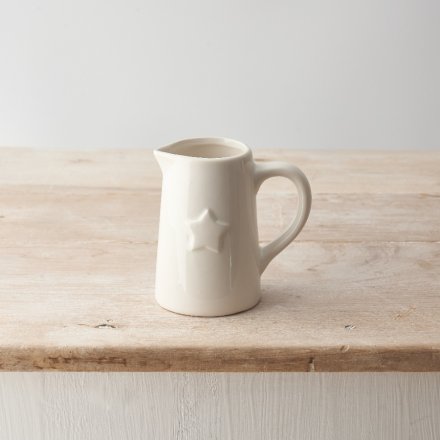 A chic and stylish ceramic jug with an embossed star detail.