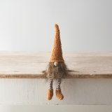 A beautifully coloured and textured shelf sitting gonk with a long brown beard, wooden nose and stripy legs.