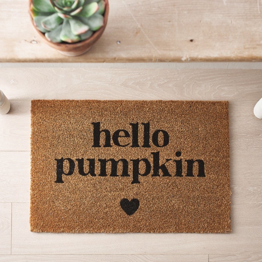 A coir doormat with a cute heart motif and sweet "hello pumpkin" message. 