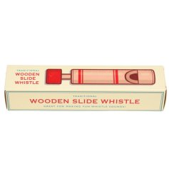 A classic wooden slide whistle in a gift box for a small gift.