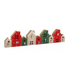 A village of cute wooden houses join together to spell Christmas. 