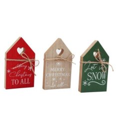 An assortment of 3 charming house shaped wooden signs each with a Christmas slogan.