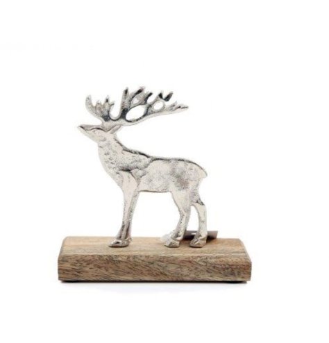 A unique and stylish seasonal decoration. Beautifully detailed with a hammered finish and wood base.