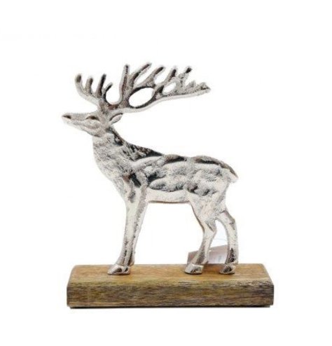 A beautifully crafted metal stag with a hammered finish. Set upon a natural mango wood base.