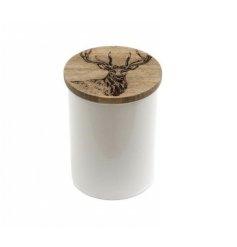 A small metal canister with mango wood lid engraved with a majestic stag design. 