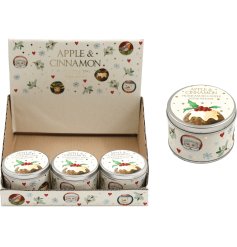 An apple and cinnamon scented candle presented in a tin featuring festive designs. 