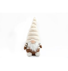 An adorable Santa gonk decoration with ribbed cream hat, striped knitted jumper and fluffy feet design. 