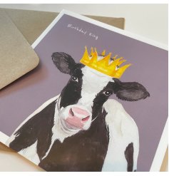 A quirky and colourful greeting card with "birthday king" text and regal cow illustration!
