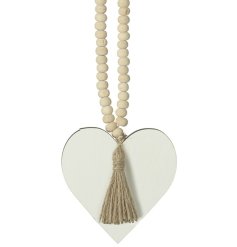 A hanging wooden heart with natural wooden beads and tassel.