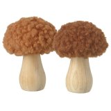 Two autumnal mushrooms with wooden base and topped with burnt orange sherpa material.