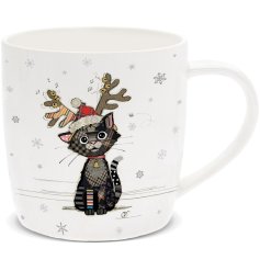 Festive kitten on a china mug illustrated by the talented Bug Art.