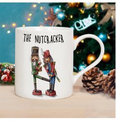 A humorous Christmas mug with a colourful and quirky nutcracker illustration by the talented Bewilderbeest