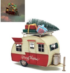 A retro caravan ornament with gifts and a Christmas tree. 