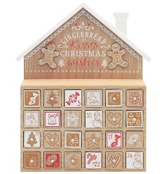 A reusable wooden advent calendar in gingerbread design.