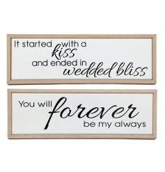 An assortment of 2 stylish framed wooden signs with wedding and love slogans. 