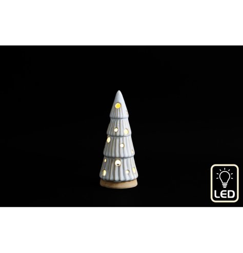 A stylish Christmas Tree ornament featuring LED lights inside and cut out baubles