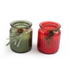 2 Tall ribbed festive candles in traditional green and red colours.