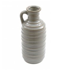 A grey stoneware vase with ribbed design, distressed detailing and handle. 