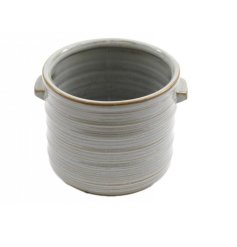 A stoneware planter with a textured ribbed design in a grey colour scheme with distressed edging. 