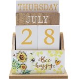 Decorated with sunflowers and bees a wooden calendar.