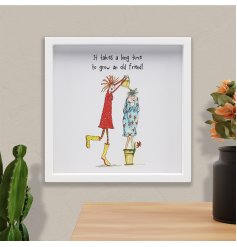 A wooden plaque with box frame & fun illustration depicting friendship &  "it takes a long time to grow an old friend".