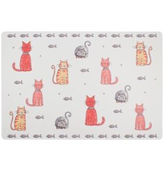 A cute placemat with a repeat cat print and fish detail border. 
