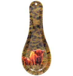 A melamine spoon rest featuring a highland cow and calf print within a beautiful countryside setting. 