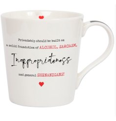 A stylish white ceramic mug with red heart details and fun friendship quote!