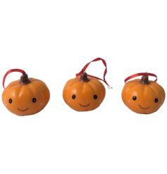 An adorable pumpkin decoration with a cute painted face and red ribbon hanger. 