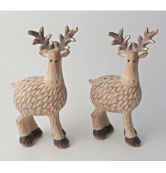 An standing reindeer, featuring quirky markings, small beaded black eyes and two toned antlers