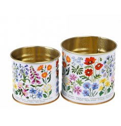 A set of 2 tins each with colourful wildflower illustrations including poppies and foxgloves. 