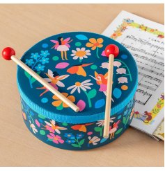 Introduce sound and rhythm to children with this charming toy drum featuring a print of fairies among flowers