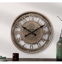 A large wall clock with cut out features, cog design and beautiful silver colour scheme. 