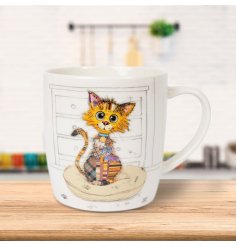 A fine china mug with artist Bug Art's colourful Kimba Kitten. 