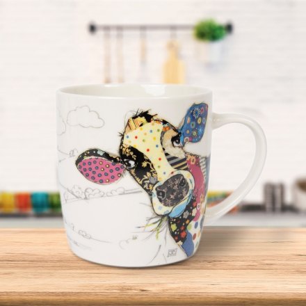 A fine china mug with artist Bug Art's colourful Connie Cow. 