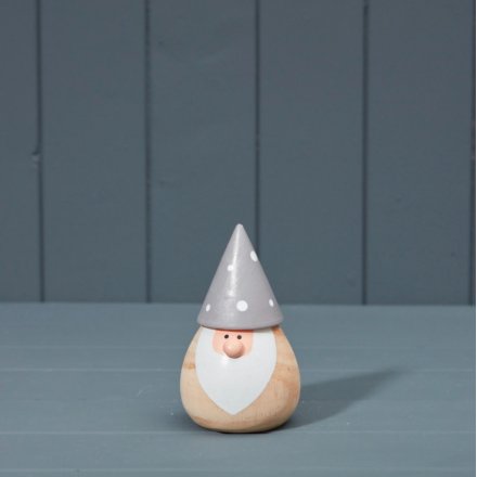 rustic wooden Santa decoration with an oversized cone hat