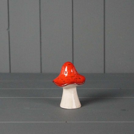 A cute little mushroom ornament, in a deep red and grey colour way. Slightly slanted for that rustic edge effect