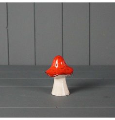 A cute little mushroom ornament, in a deep red and grey colour way. Slightly slanted for that rustic edge effect