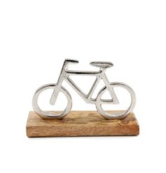 A stylish decorative accessory for cycling or sport enthusiasts. A beautifully hammered silver bike set upon a natural 